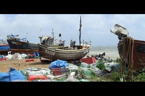 Fishing boats on Hastings beach attract many tourists